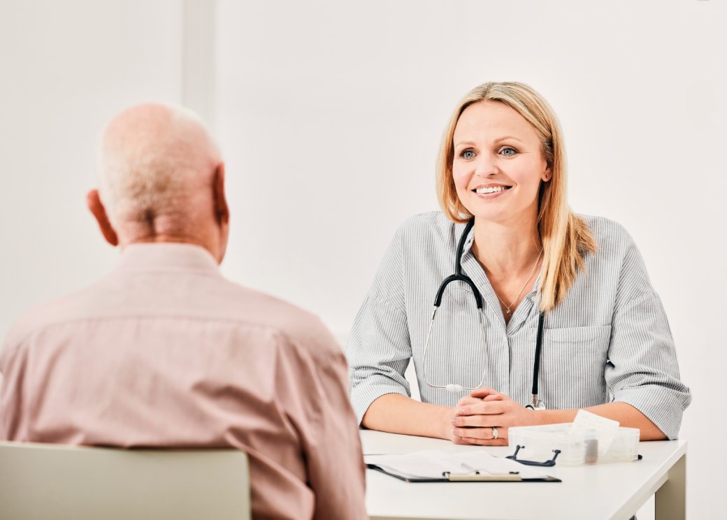 Healthcare professional talking to a patient